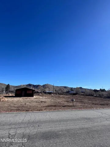 a view of ocean with sunset