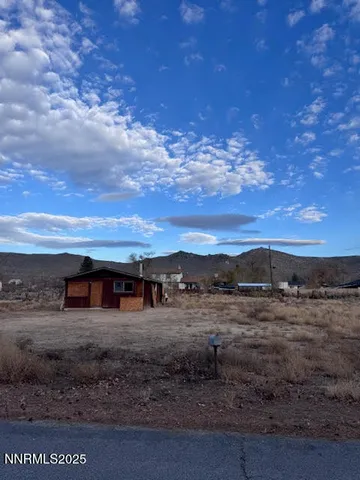 a view of house with outdoor space