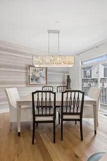 a view of a room with furniture window and wooden floor