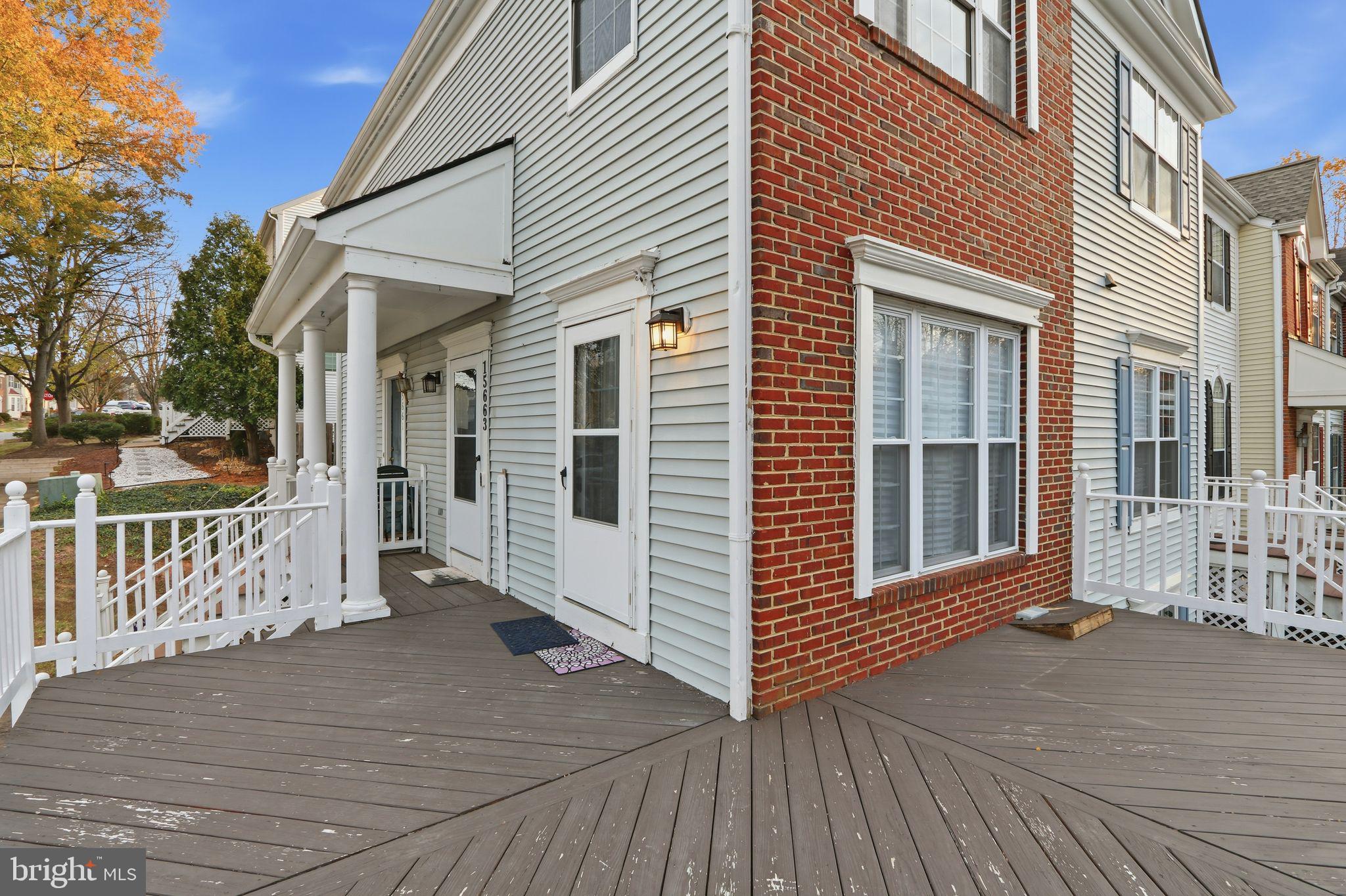 15663 Viewpoint Circle Dumfries, VA 22025 - Photo 2 of 30 a view of a house with a deck