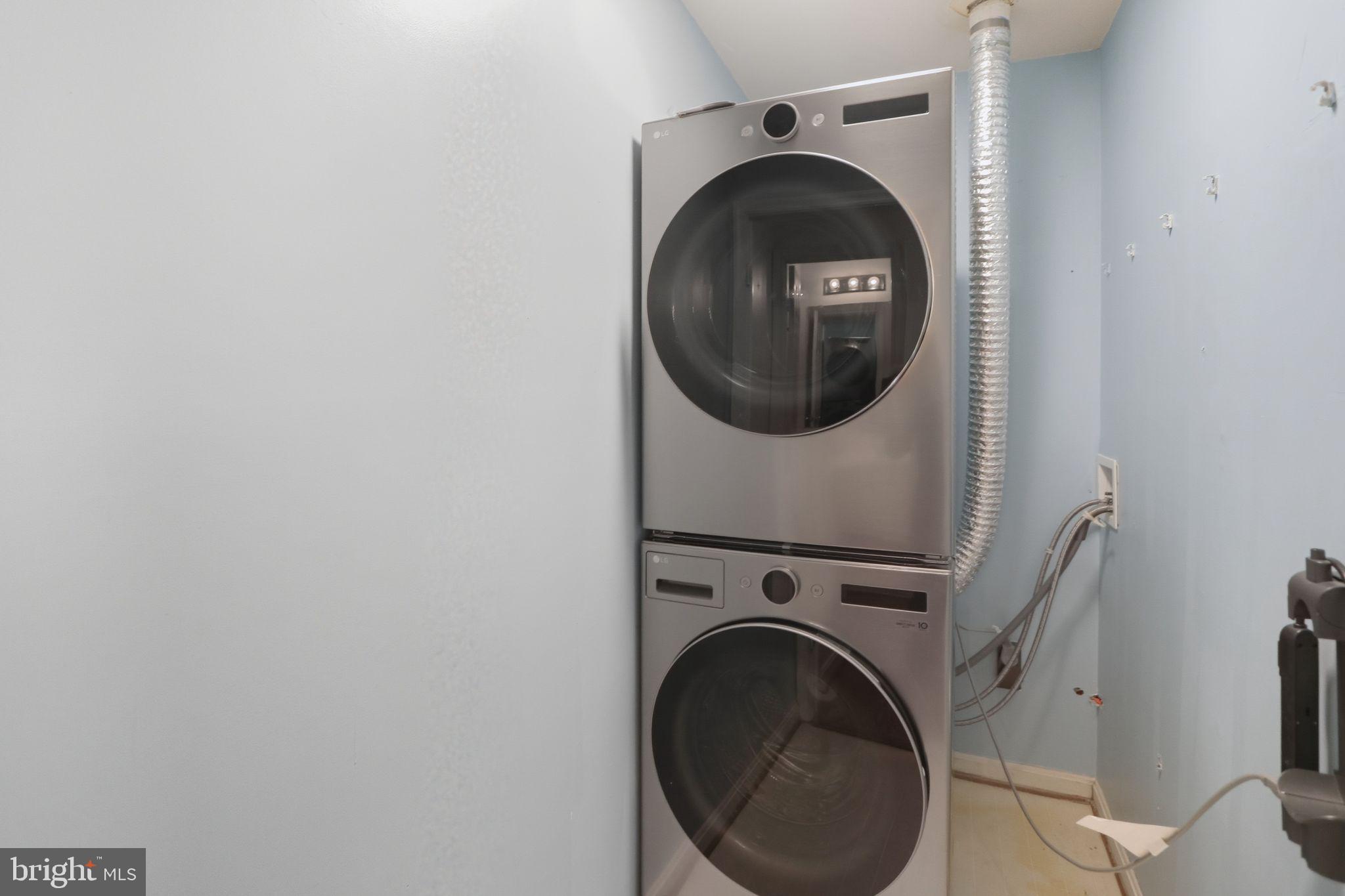 15663 Viewpoint Circle Dumfries, VA 22025 - Photo 24 of 30 a close up view of a washer and dryer