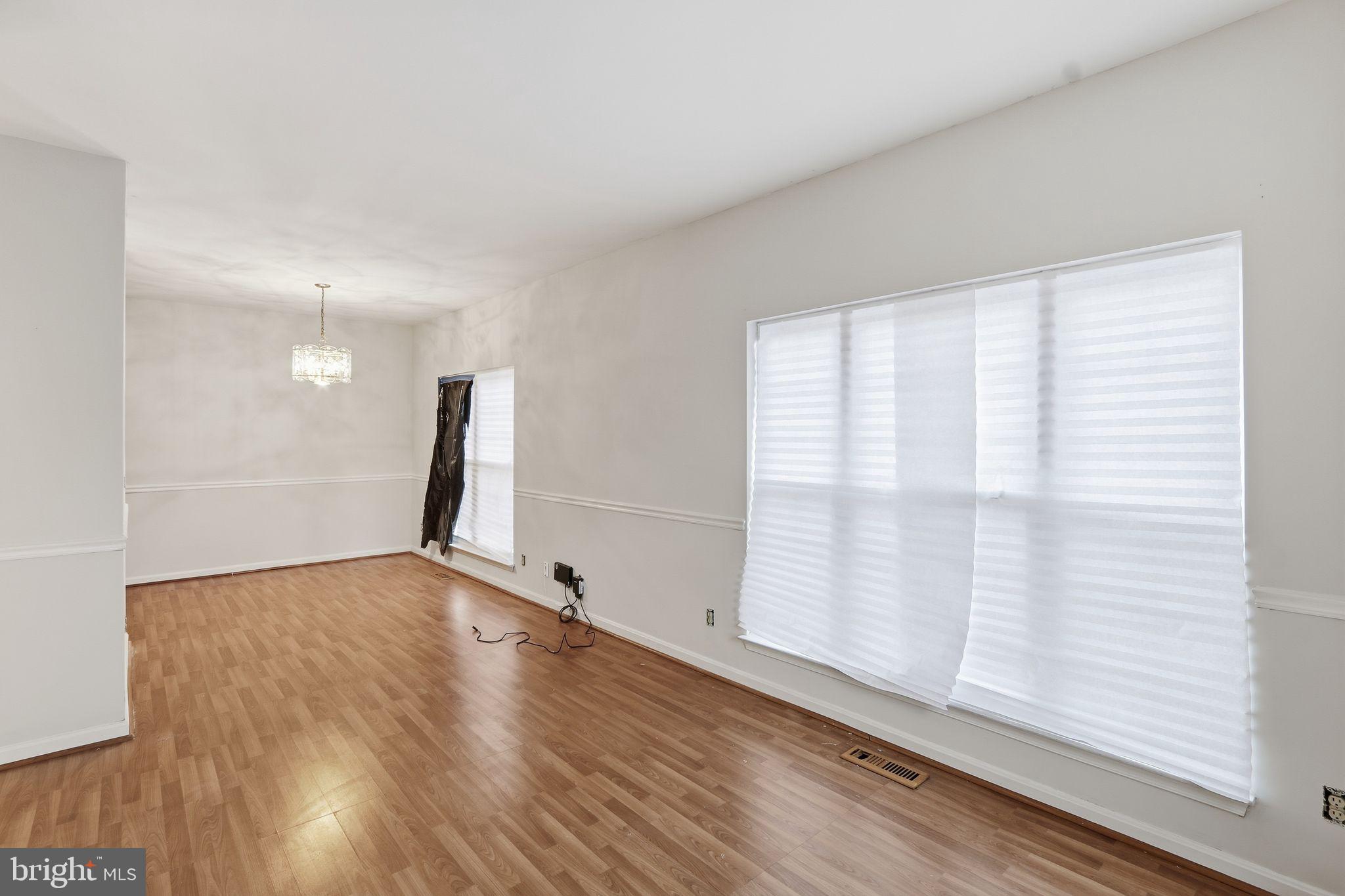 15663 Viewpoint Circle Dumfries, VA 22025 - Photo 8 of 30 a view of empty room with wooden floor and fan