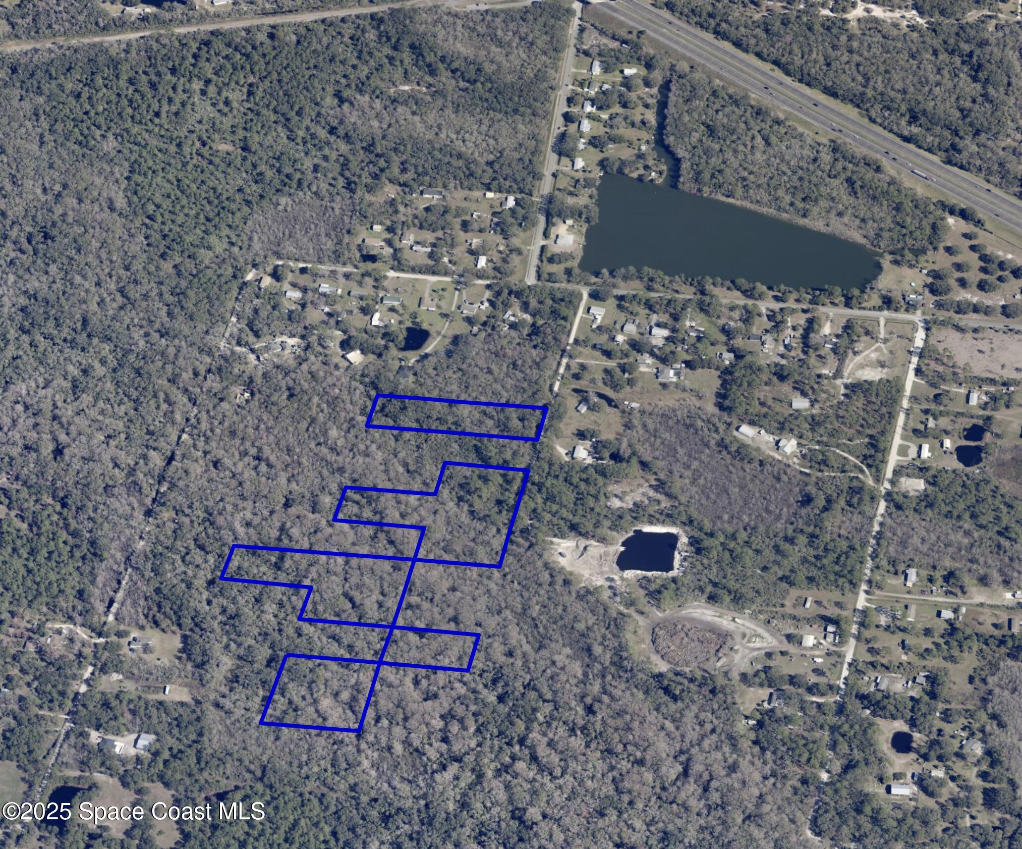 0 Spanks Street Mims, FL 32754 - Photo 6 of 9 a brick building with a bench