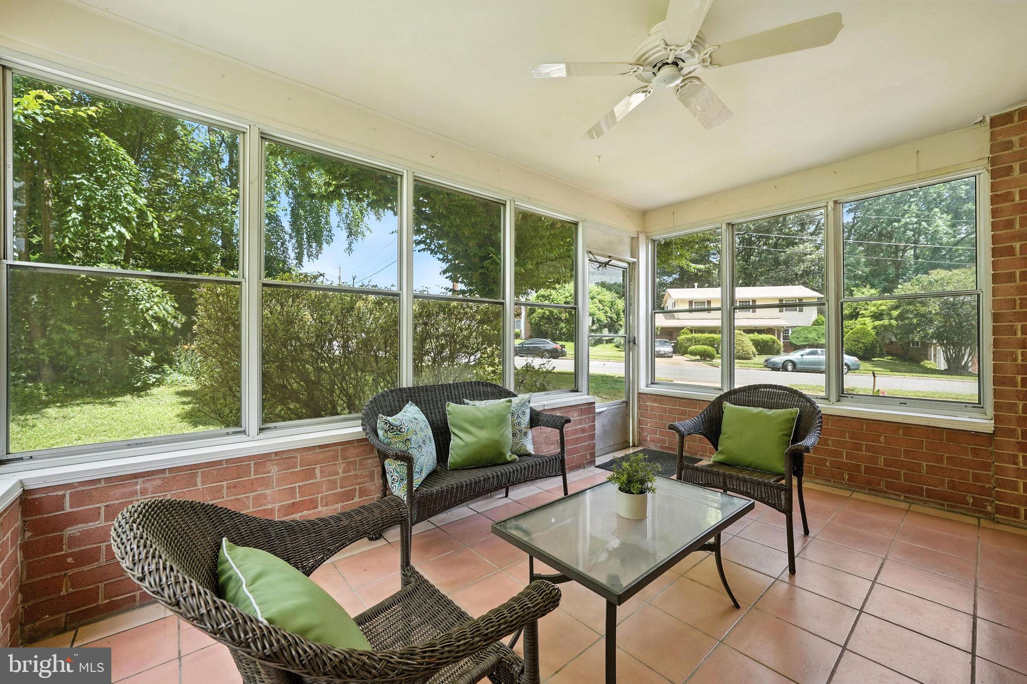 6910 Barnack Drive Springfield, VA 22152 - Photo 19 of 44 a living room with furniture and a window