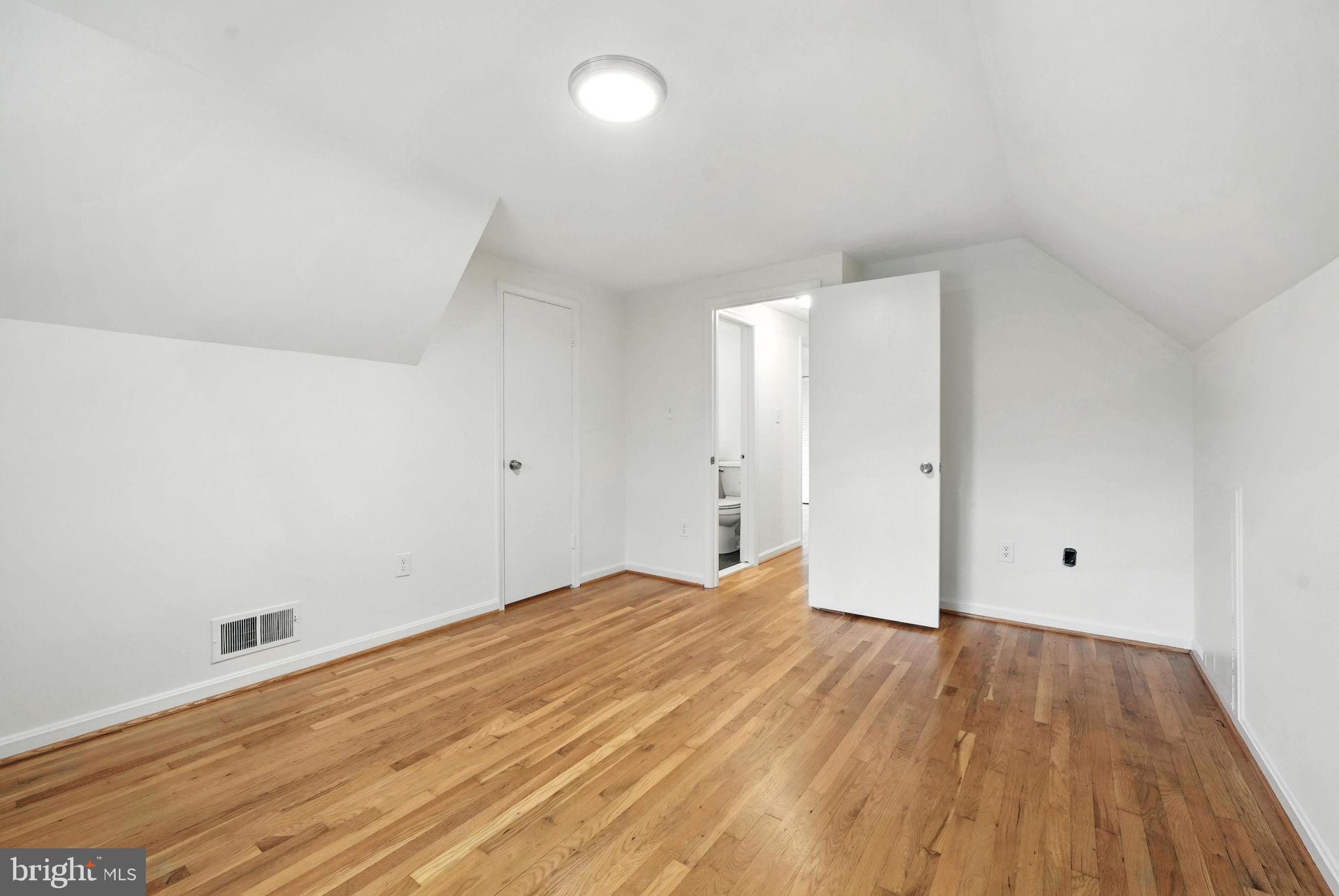 6910 Barnack Drive Springfield, VA 22152 - Photo 23 of 44 a view of room with wooden floor