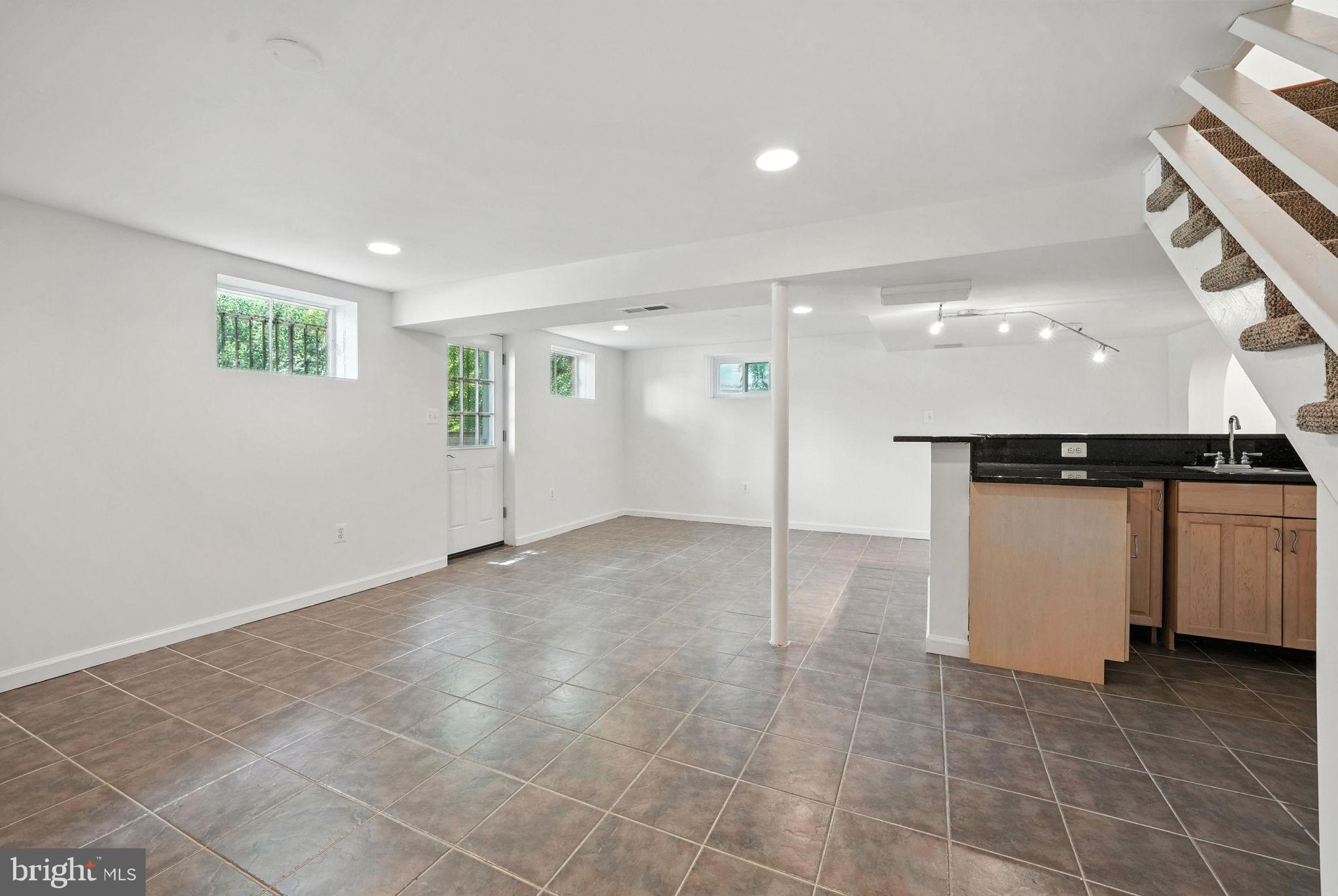6910 Barnack Drive Springfield, VA 22152 - Photo 29 of 44 a view of a big room with closet and windows