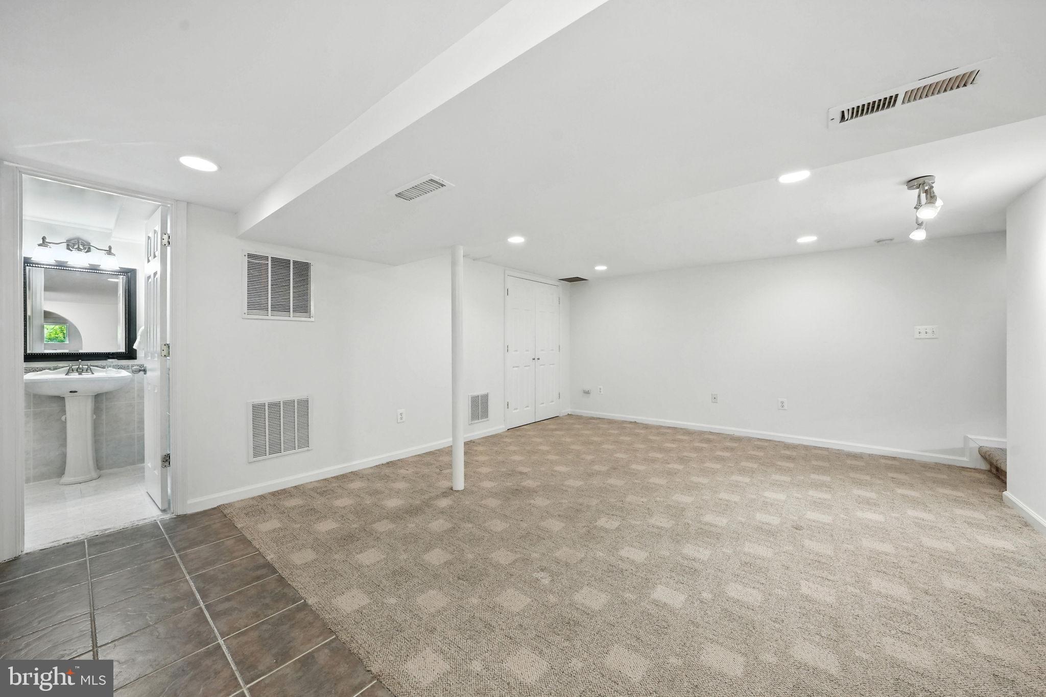 6910 Barnack Drive Springfield, VA 22152 - Photo 32 of 44 a view of an empty room