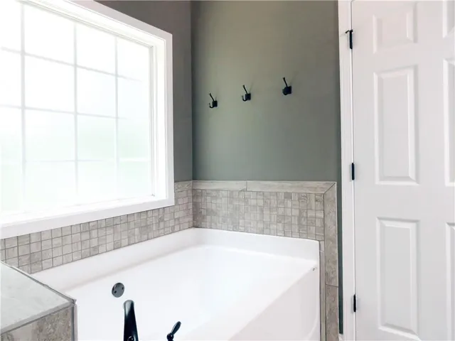a bathroom with a bathtub