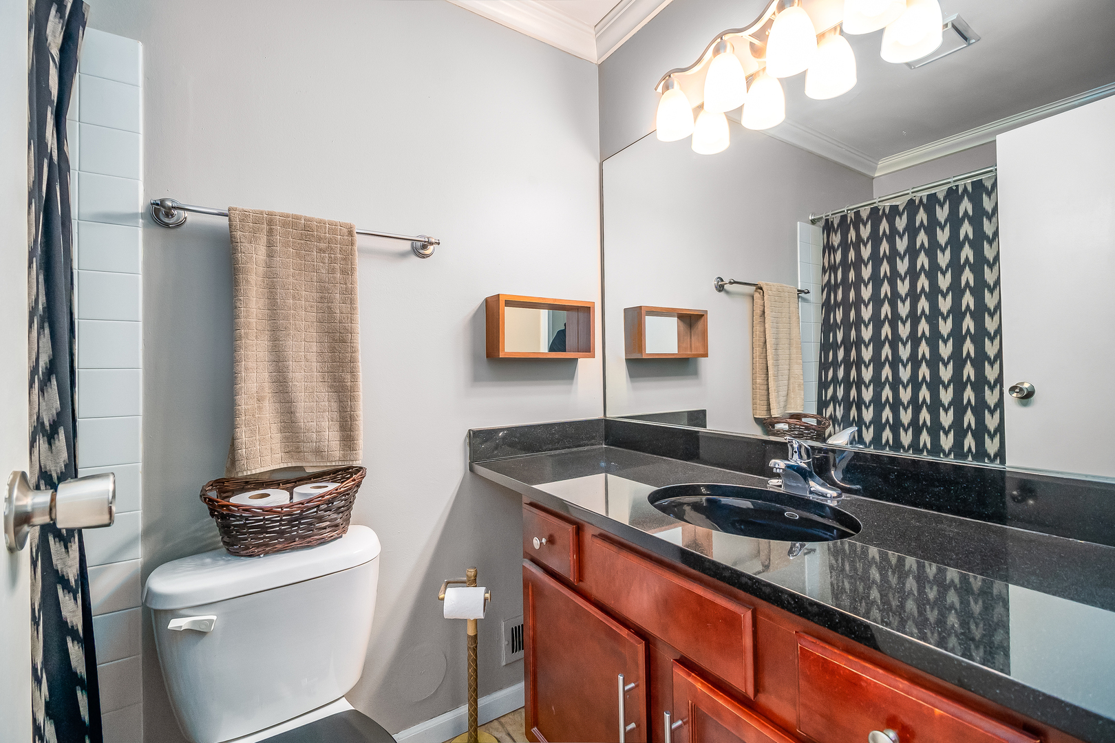 6015 Forest View Road, Unit 1A Lisle, IL 60532 - Photo 19 of 32 a bathroom with a sink and a mirror