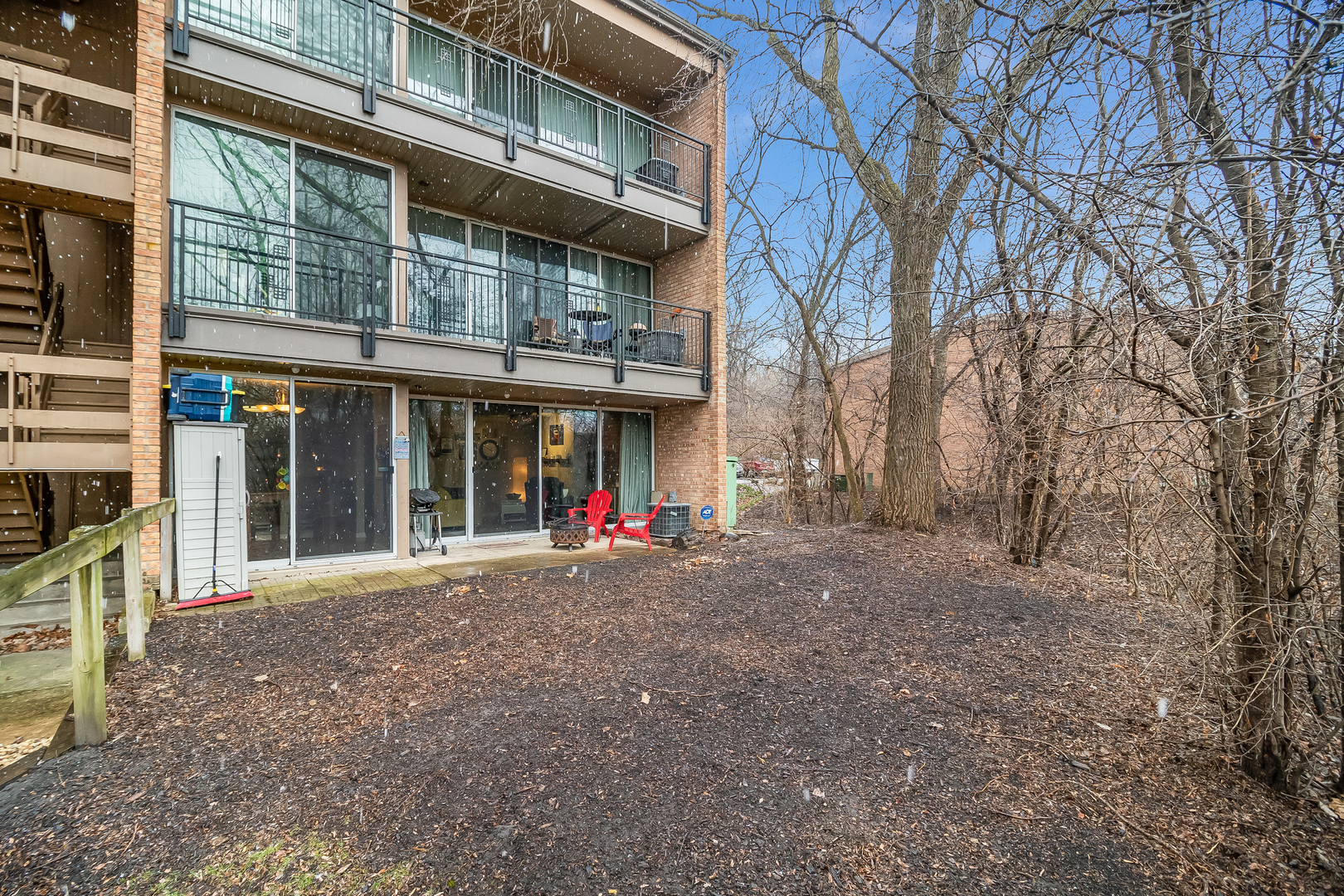 6015 Forest View Road, Unit 1A Lisle, IL 60532 - Photo 21 of 32 a view of a building with a outdoor space