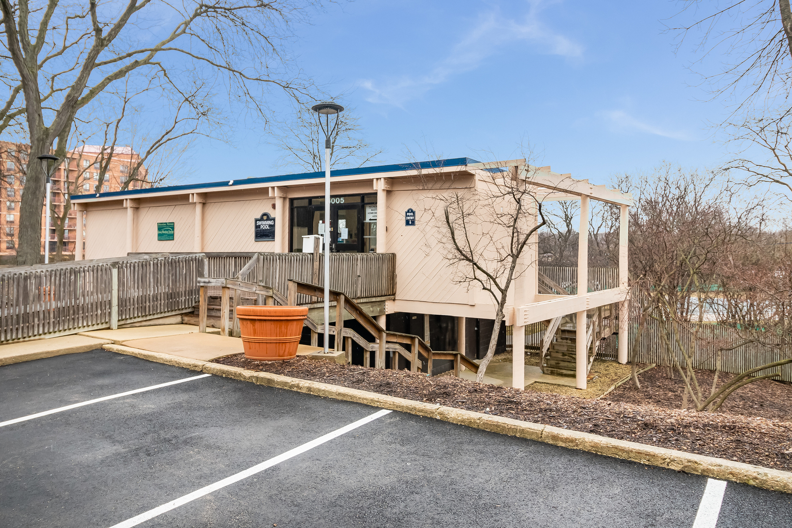 6015 Forest View Road, Unit 1A Lisle, IL 60532 - Photo 26 of 32 a view of a house with a backyard and a patio