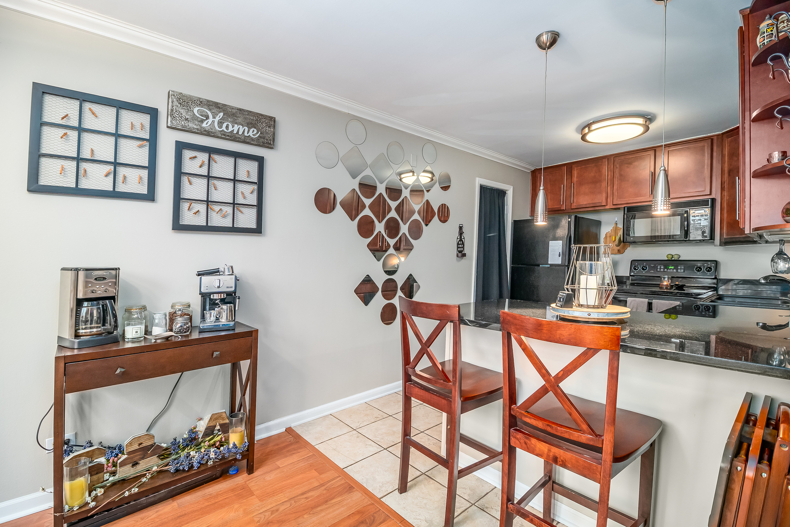 6015 Forest View Road, Unit 1A Lisle, IL 60532 - Photo 8 of 32 a dining room with furniture and wooden floor