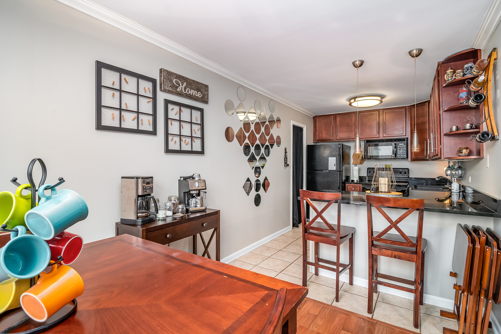 6015 Forest View Road, Unit 1A Lisle, IL 60532 - Photo 9 of 32 a room with musical instruments and air hockey table