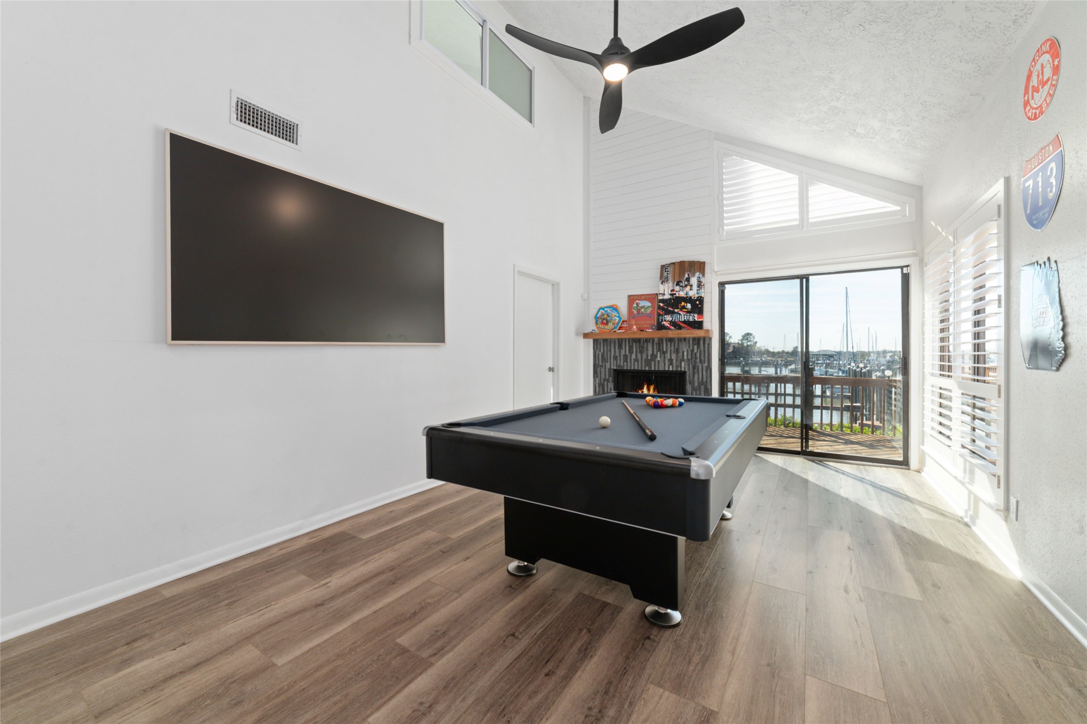 717 Davis Road League City, TX 77573 - Photo 11 of 32 a room with furniture and a flat screen tv