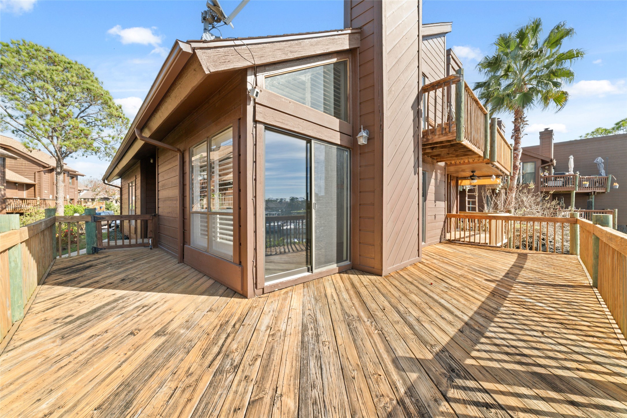 717 Davis Road League City, TX 77573 - Photo 25 of 32 a view of a house with a balcony