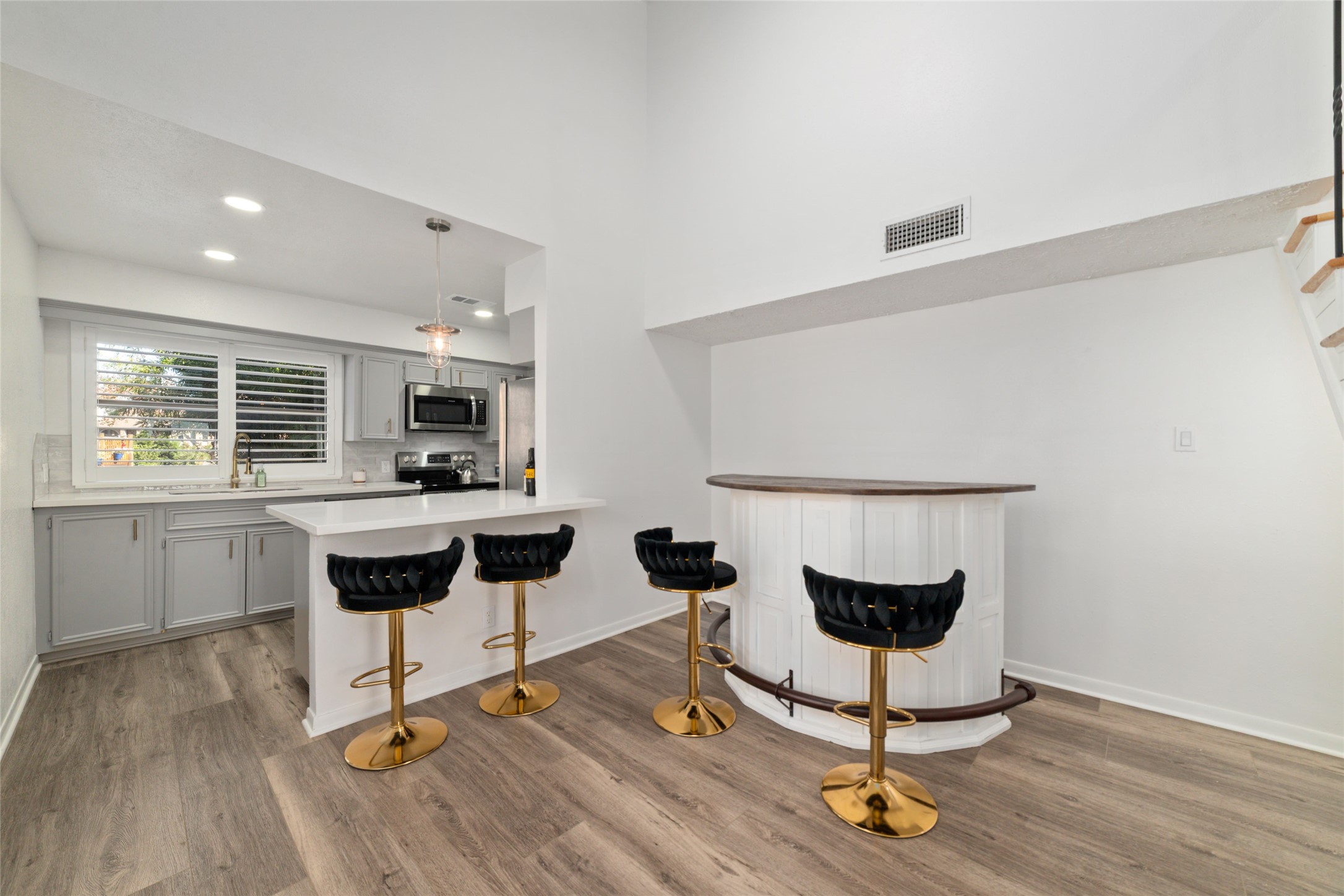 717 Davis Road League City, TX 77573 - Photo 4 of 32 a view of a kitchen with dining table and chairs