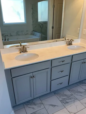 a bathroom with a sink and a toilet