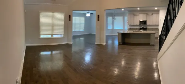 a view of a room that has a window in it
