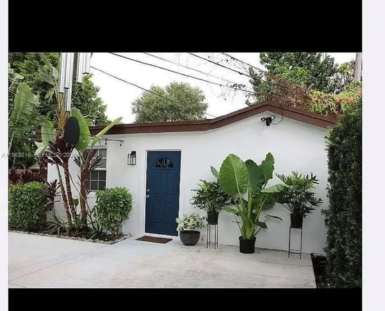a view of backyard of a house