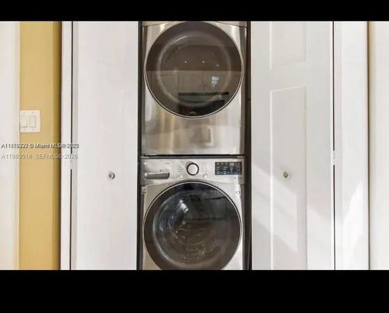 a bathroom with a sink toilet a mirror and vanity
