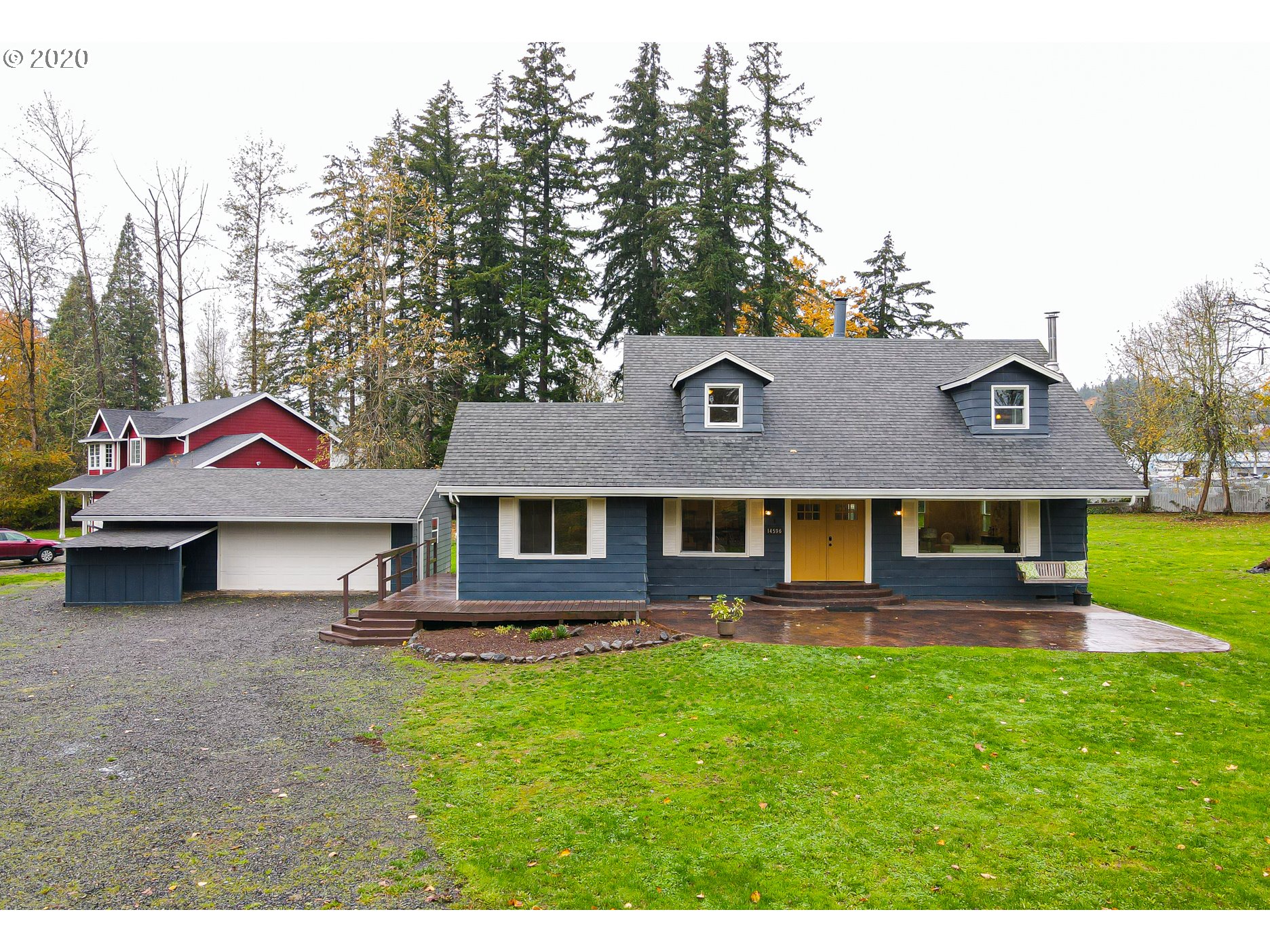 14596 Southeast Red Dirt Road Damascus, OR 97089 - Photo 1 of 31 a front view of house with yard and green space