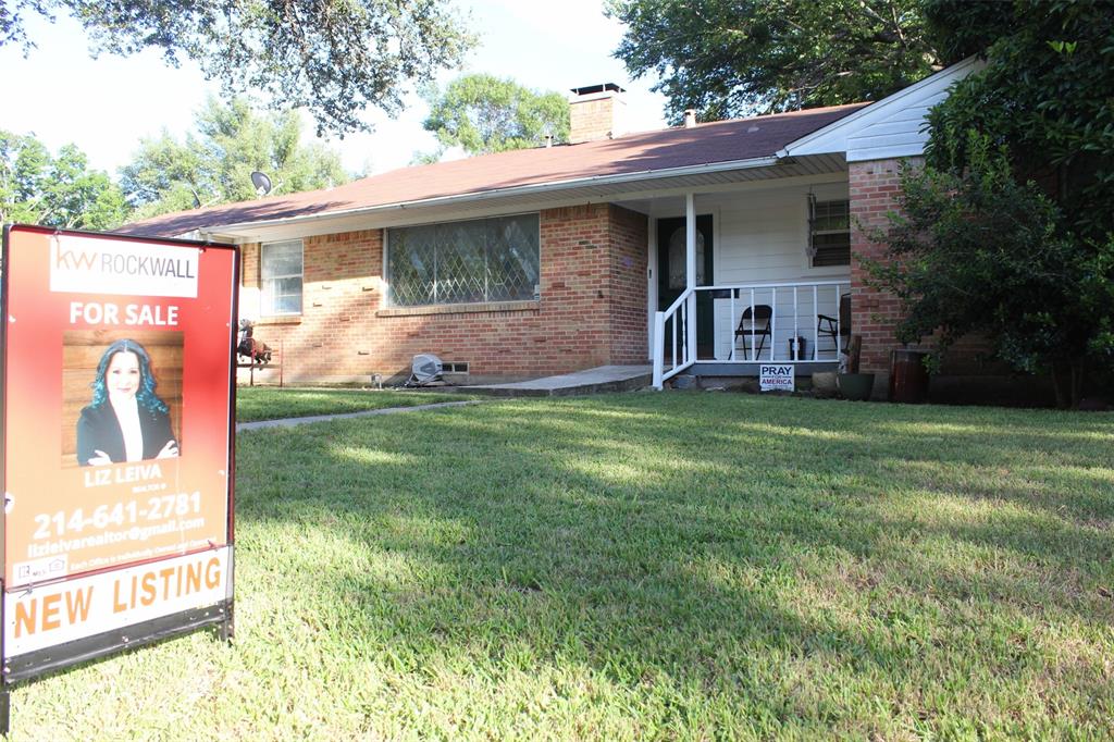 612 Ranier Circle Garland, TX 75041 - Photo 2 of 29 a view of a back yard of the house