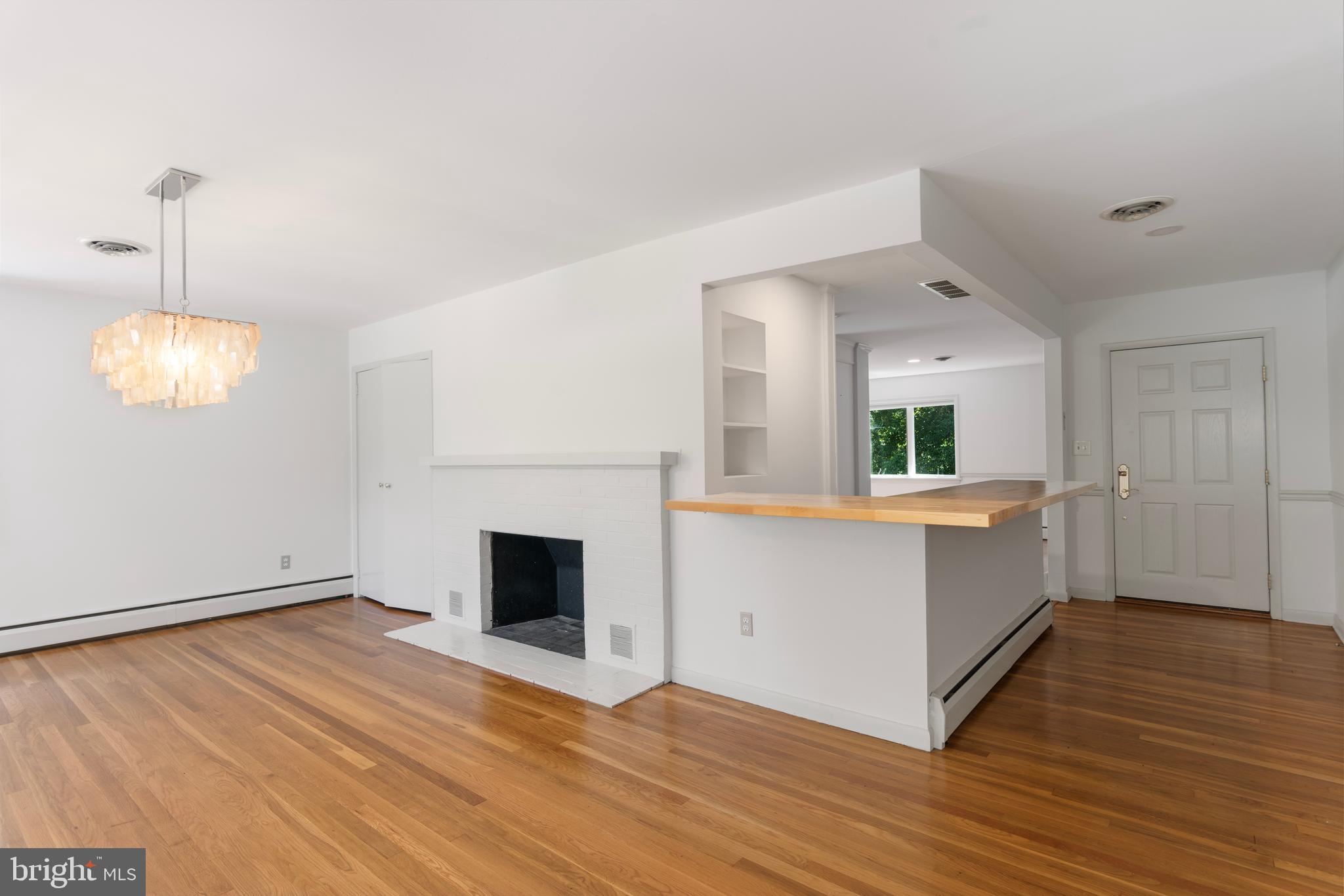 25800 Collins Avenue Chestertown, MD 21620 - Photo 7 of 31 a view of kitchen with granite countertop cabinets and wooden floor