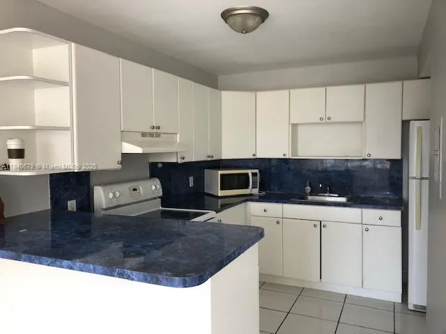 $1,500 | 2025 Northeast 164th Street, Unit 407, North Miami Beach, FL 33162