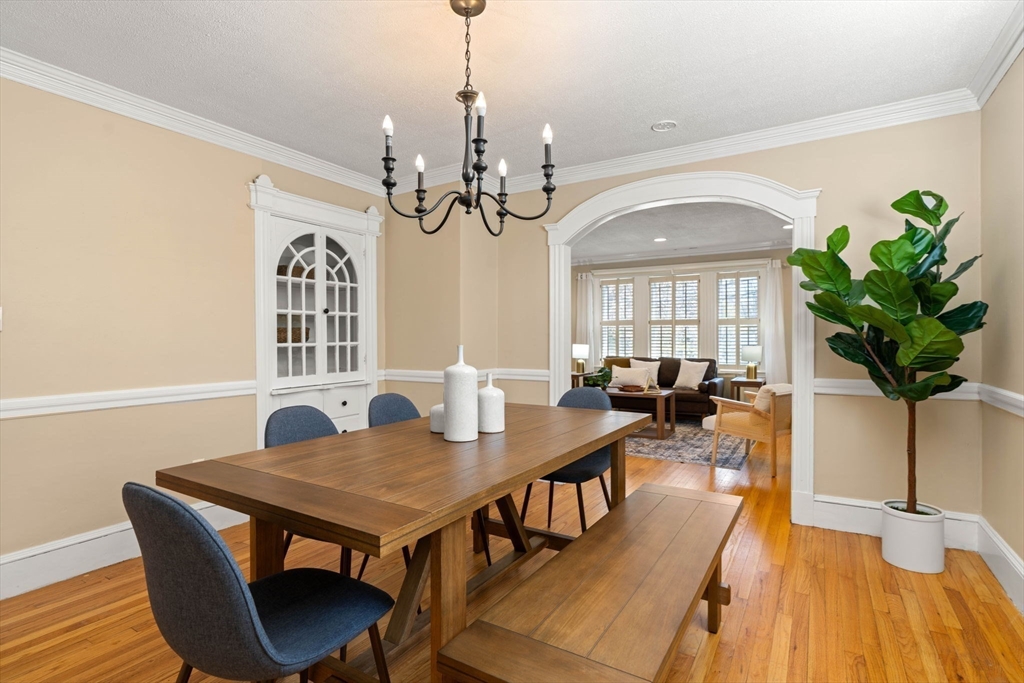 156 Russett Road Boston, MA 02132 - Photo 11 of 32 a view of a dining room with furniture window and wooden floor