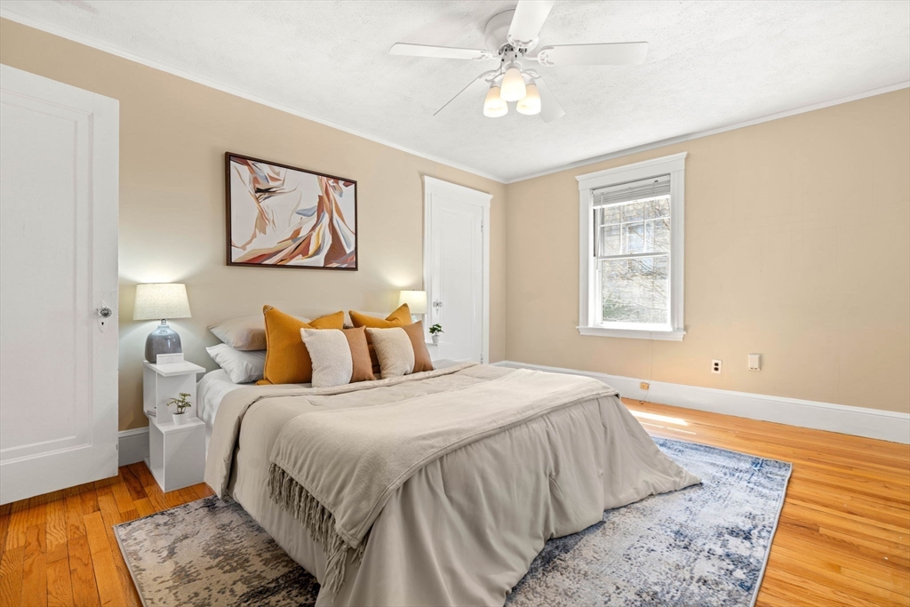 156 Russett Road Boston, MA 02132 - Photo 17 of 32 a bedroom with a bed and a window