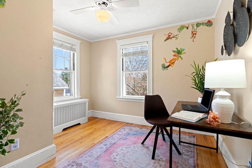 156 Russett Road Boston, MA 02132 - Photo 21 of 32 a workspace with furniture window and wooden floor