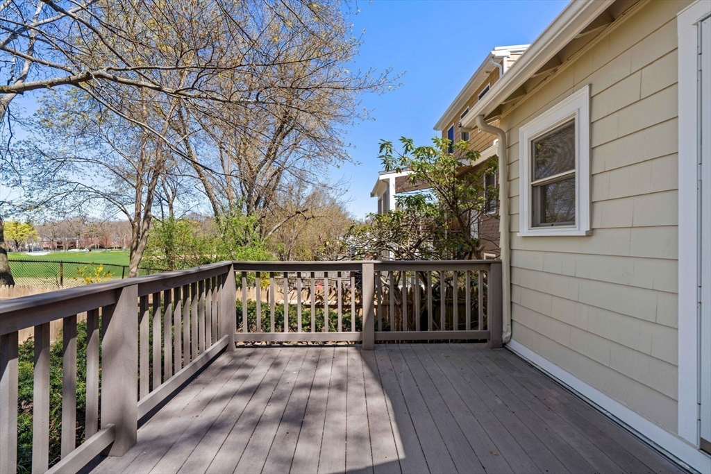156 Russett Road Boston, MA 02132 - Photo 25 of 32 a view of a deck with wooden floor and fence