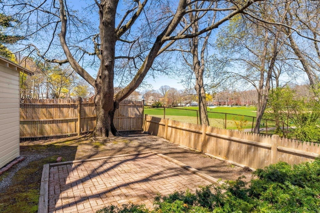 156 Russett Road Boston, MA 02132 - Photo 27 of 32 a view of a house with a yard and tree s