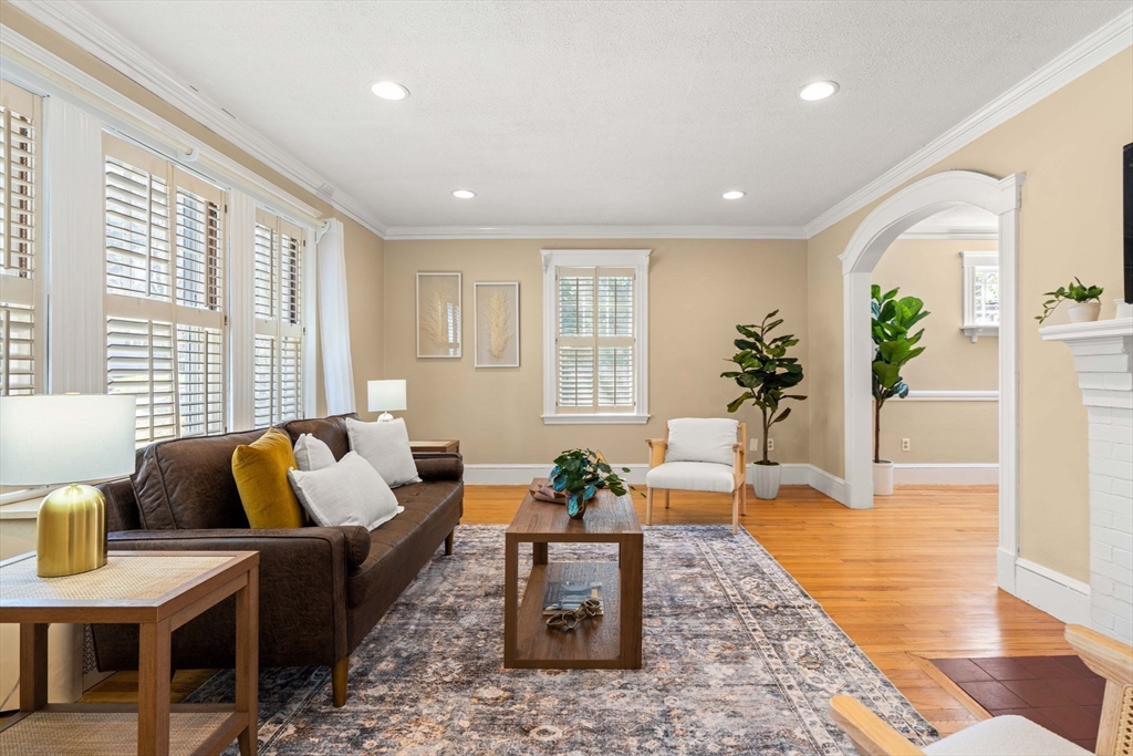 156 Russett Road Boston, MA 02132 - Photo 3 of 32 a living room with furniture and wooden floor