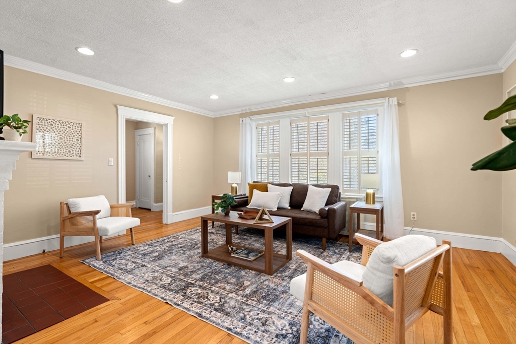 156 Russett Road Boston, MA 02132 - Photo 6 of 32 a living room with furniture and a rug