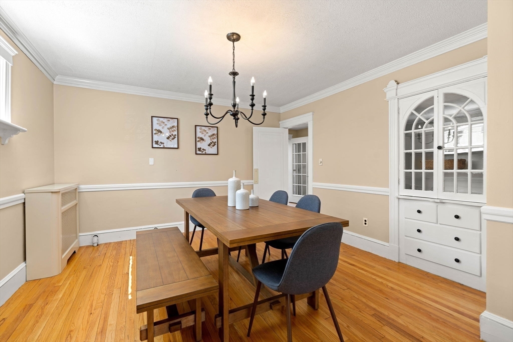 156 Russett Road Boston, MA 02132 - Photo 10 of 32 a view of a dining room with furniture window and wooden floor
