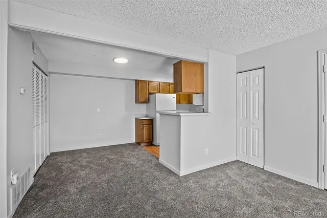 a view of a storage & utility room with a sink
