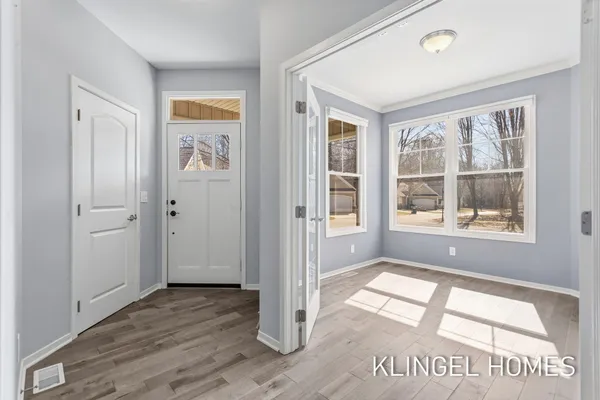 $649,500 | 16480 Springvale Court, Spring Lake, MI 49456