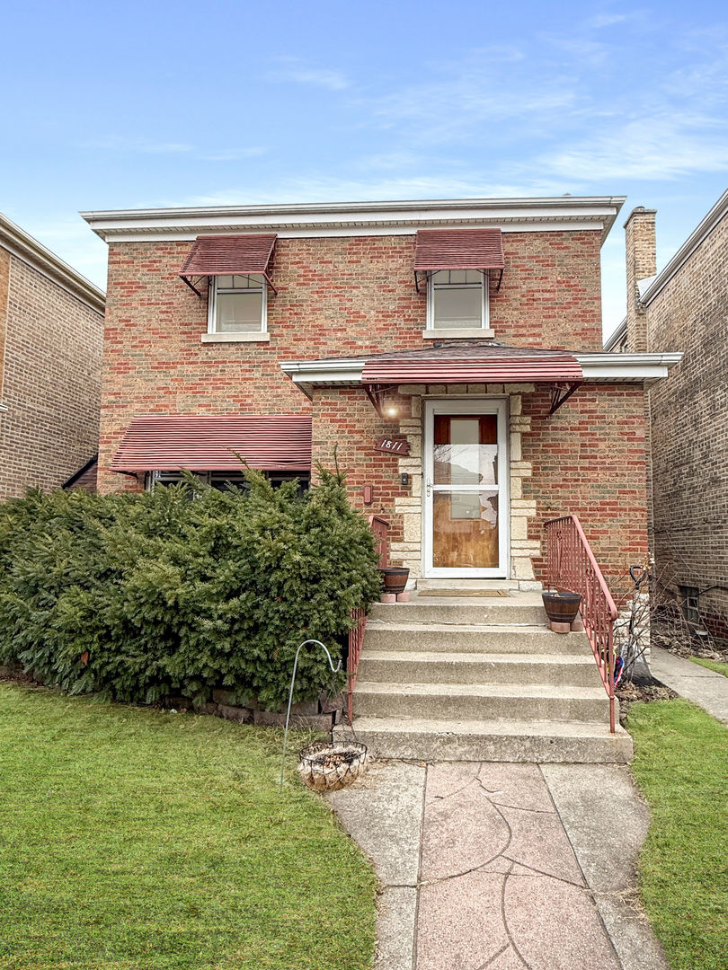 1811 Maple Avenue Berwyn, IL 60402 - Photo 1 of 1 a front view of a house with a garden