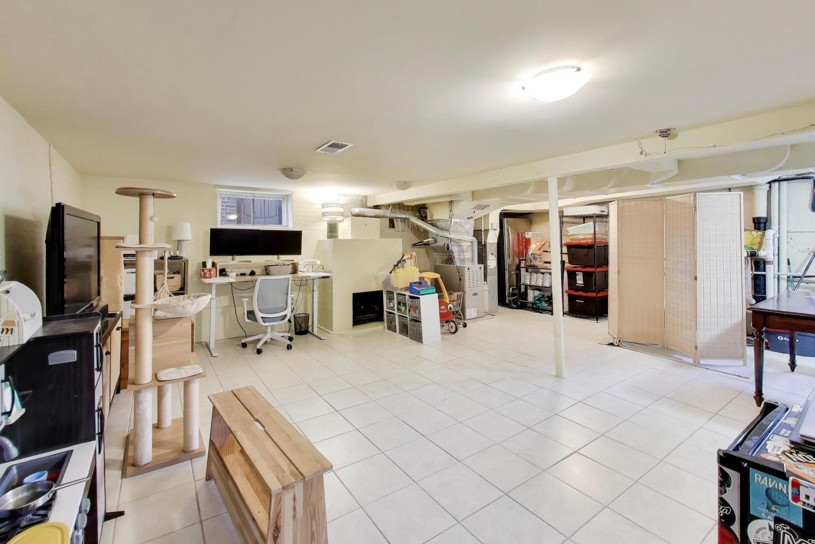 1811 Maple Avenue Berwyn, IL 60402 - Photo 24 of 31 a view of a livingroom with workspace and a window