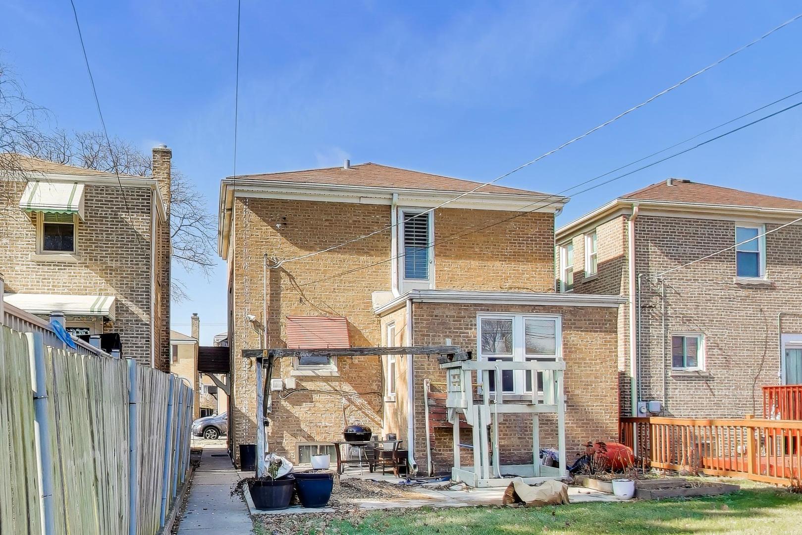 1811 Maple Avenue Berwyn, IL 60402 - Photo 27 of 31 a front view of a building with street view