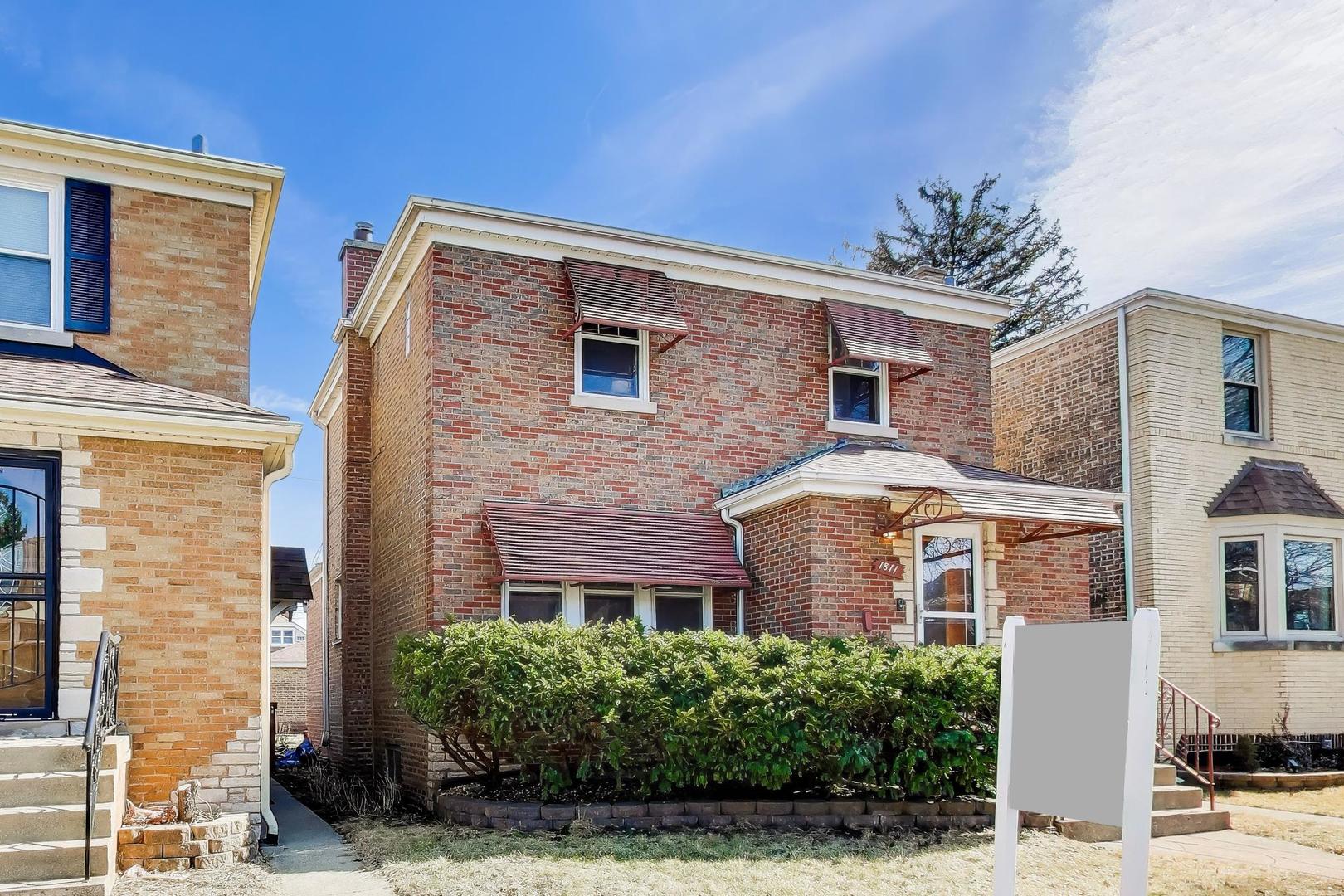 1811 Maple Avenue Berwyn, IL 60402 - Photo 3 of 31 a front view of a house with a yard