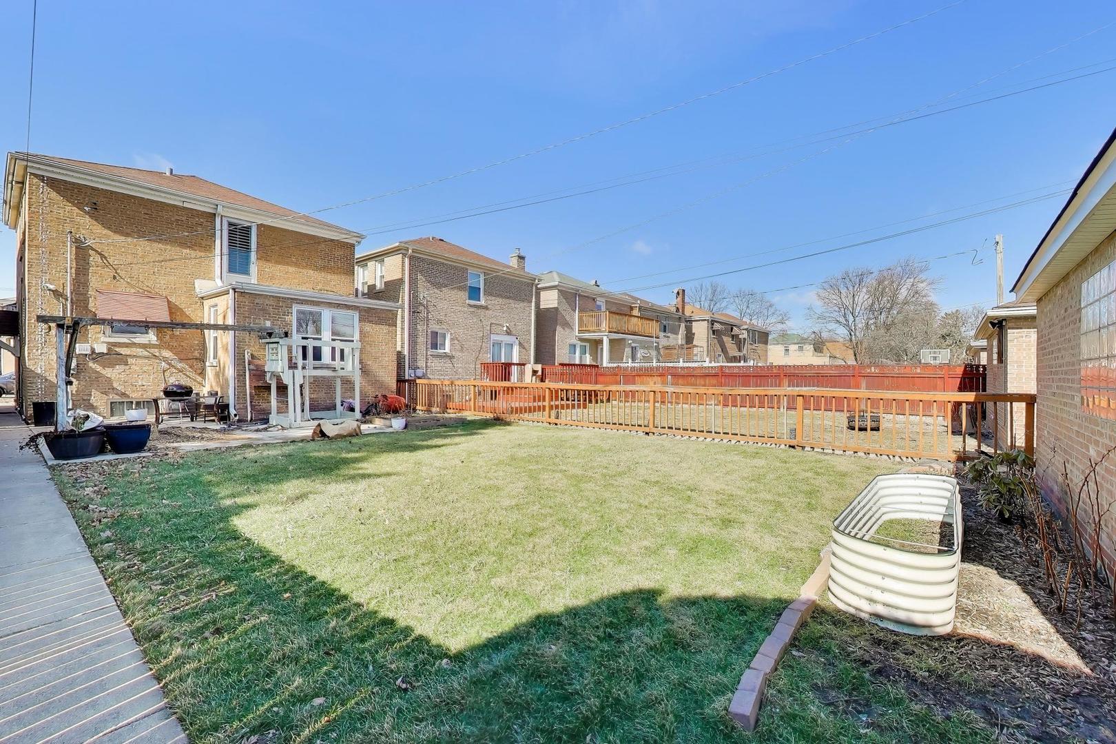 1811 Maple Avenue Berwyn, IL 60402 - Photo 31 of 31 a swimming pool with outdoor seating and yard