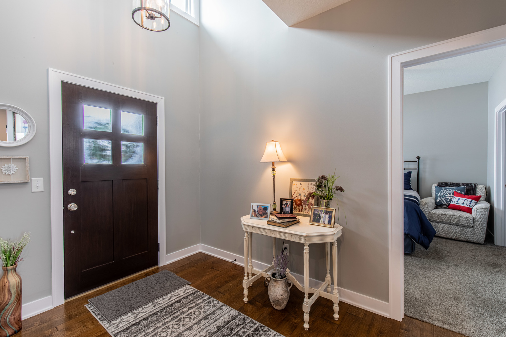 825 East Thompson Street Princeton, IL 61356 - Photo 2 of 26 a bedroom with furniture and a window