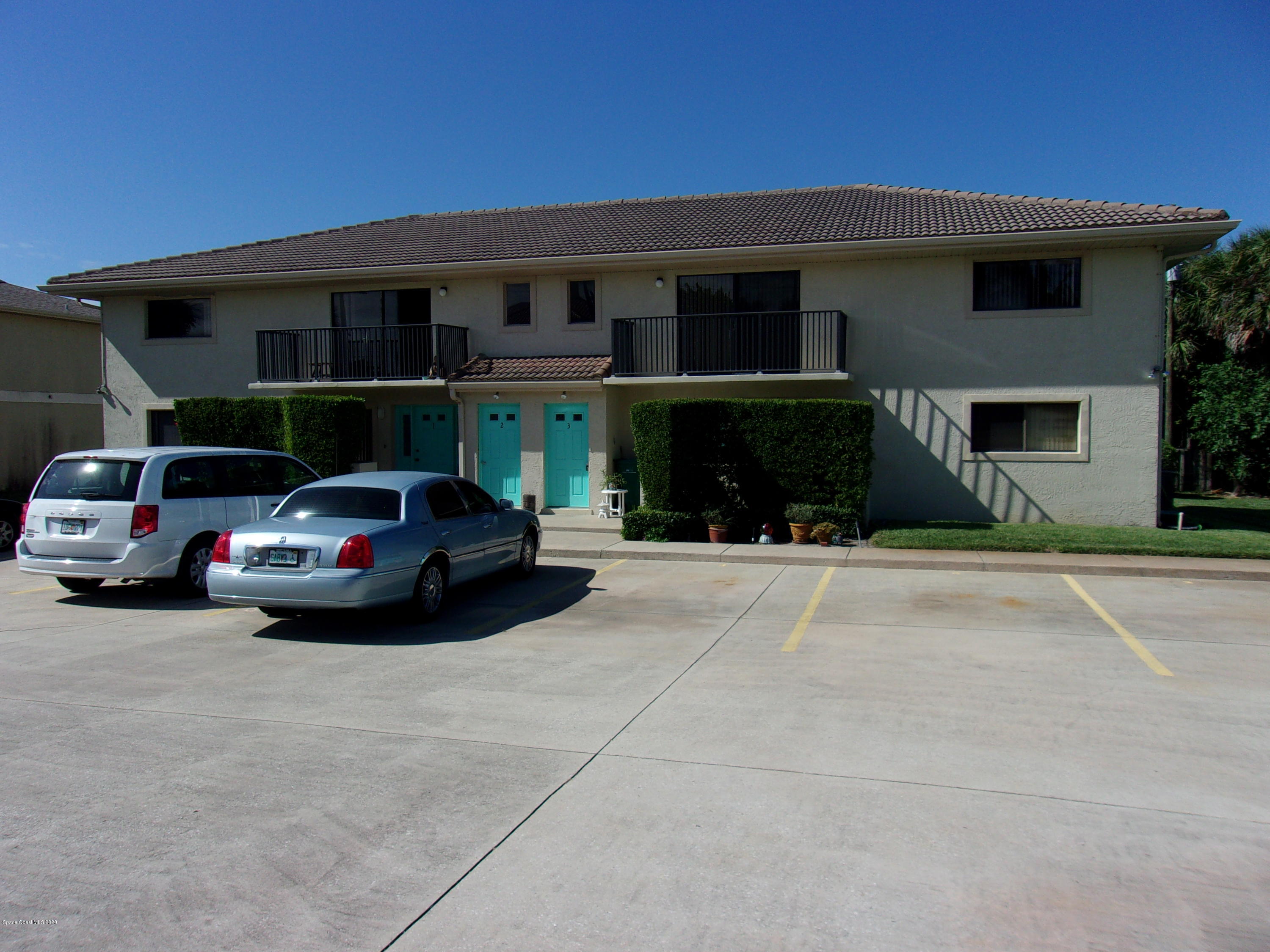 a car parked in front of a house