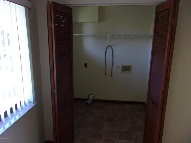 a kitchen with a stove and a cabinets