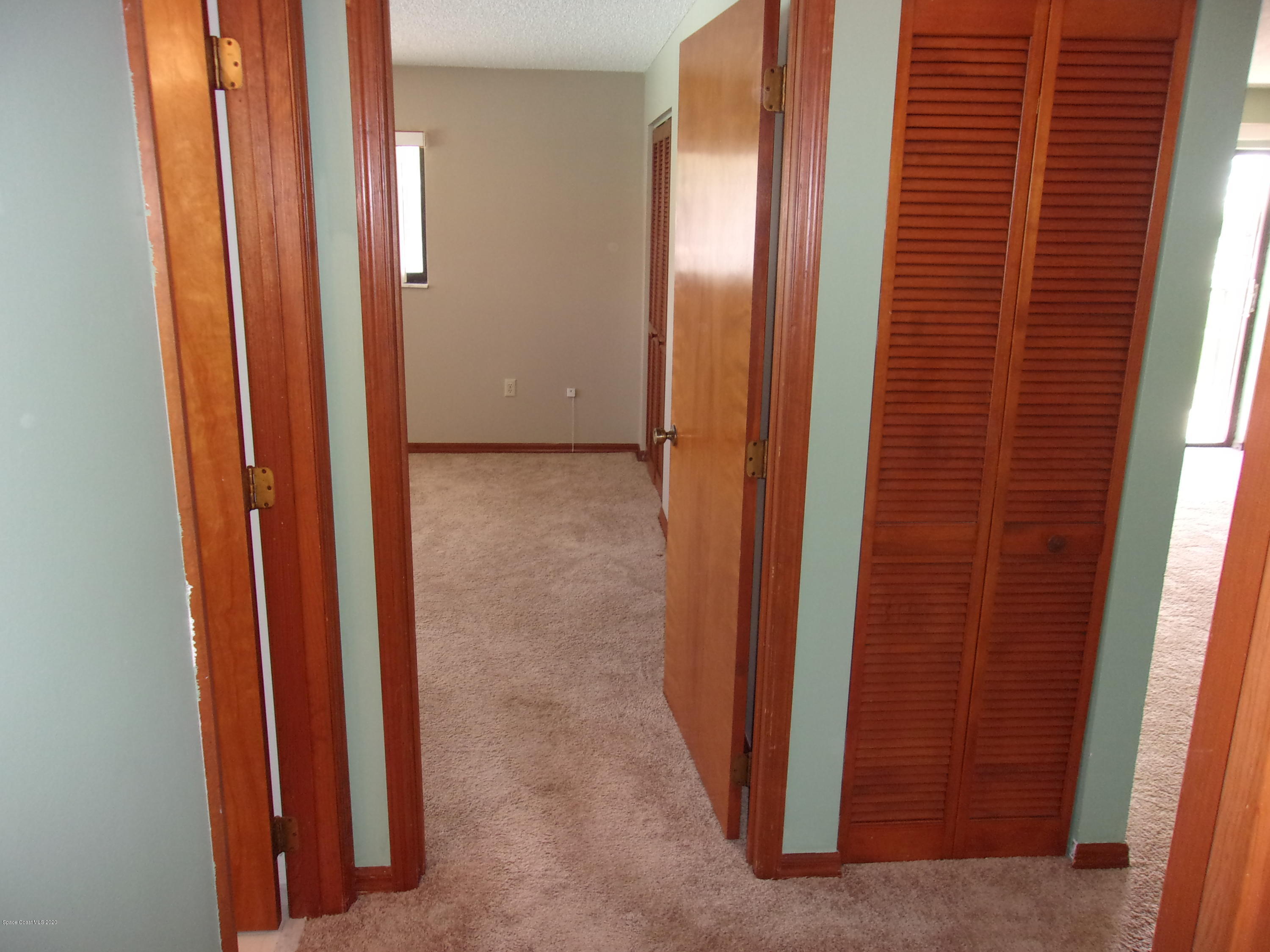 418 South Atlantic Avenue, Unit 3 Cocoa Beach, FL 32931 - Photo 22 of 29 a view of a elevator and an entryway
