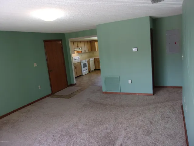 a view of balcony and yard