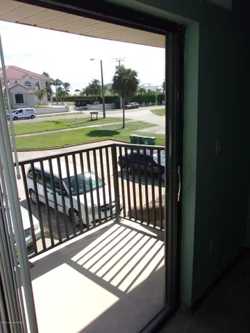 a view of a backyard with a garden and plants