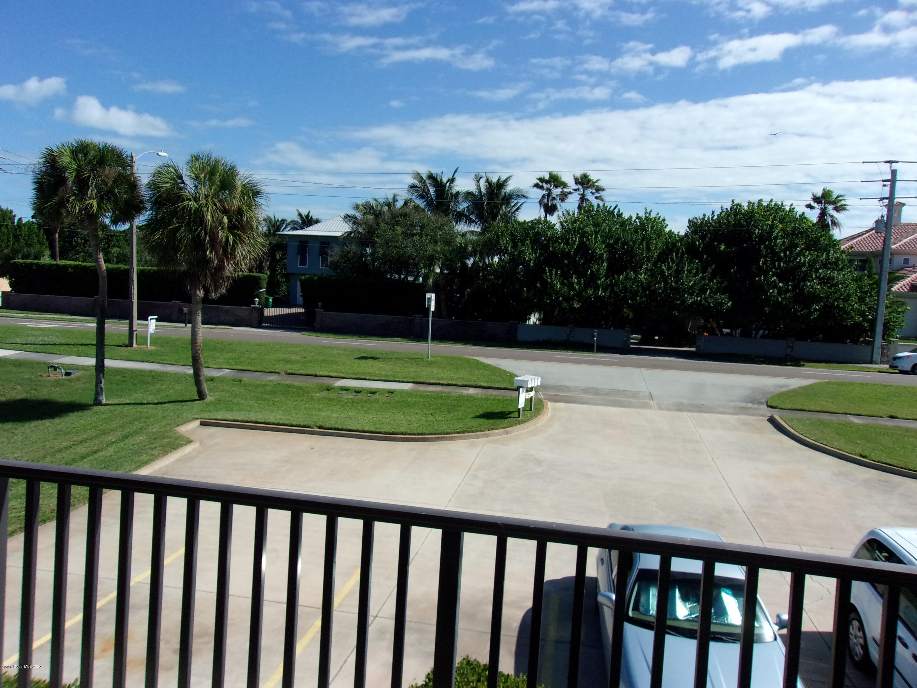 418 South Atlantic Avenue, Unit 3 Cocoa Beach, FL 32931 - Photo 8 of 29 a view of a backyard with a garden and plants